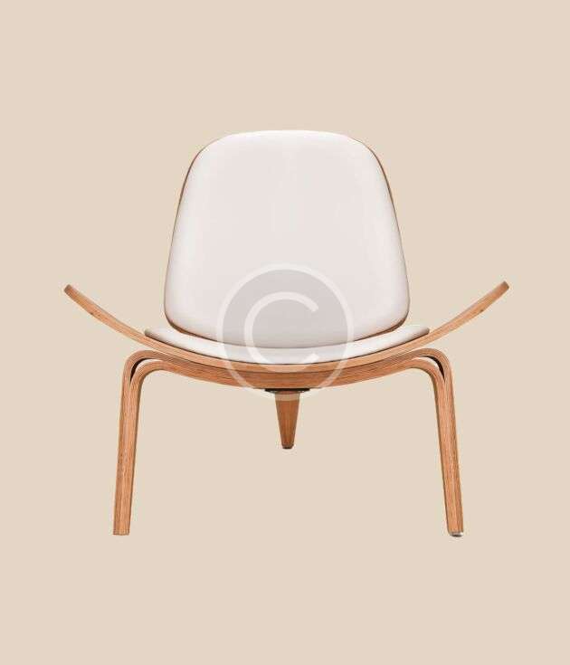 White molded accent chair with wood frame